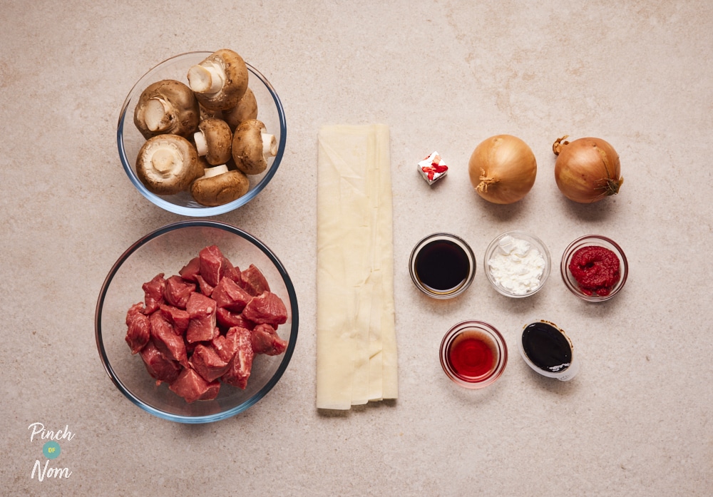 Slow Cooker Steak and Mushroom Pie ingredients on counter.