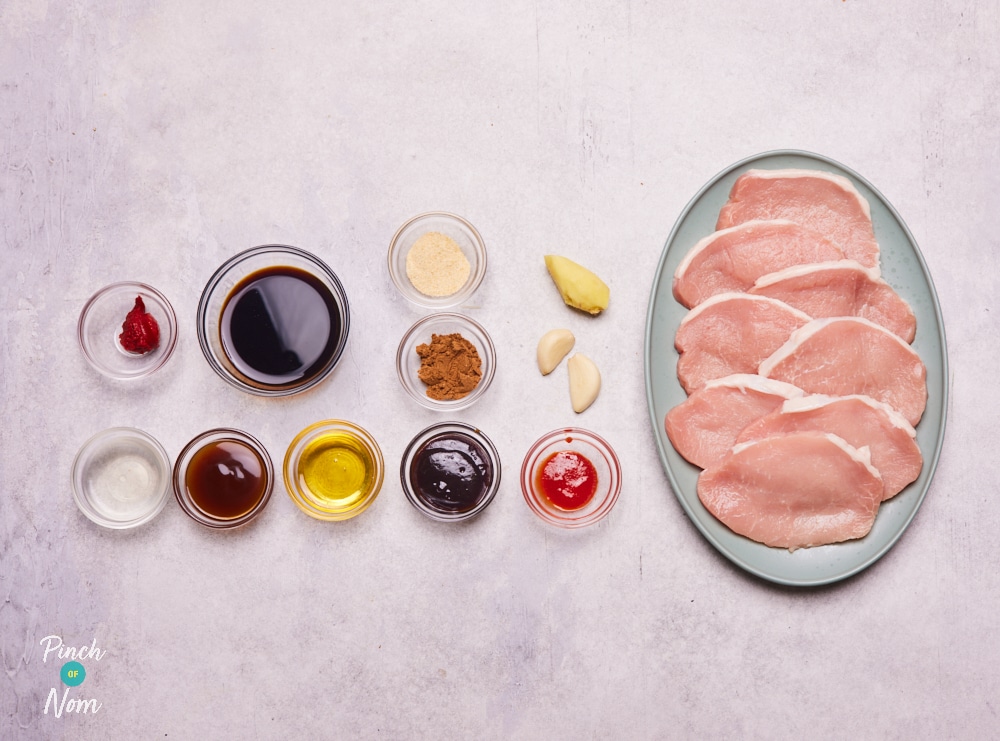 The raw ingredients for Pinch of Nom's slimming-friendly Sticky Chinese-Style BBQ Pork are laid out on a kitchen counter, ready to begin cooking.