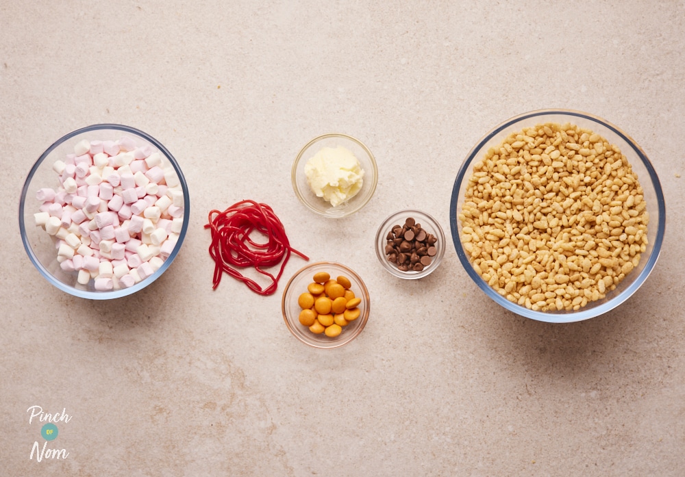 Ingredients for Rice Krispie Marshmallow Snowmen laid out on counter.
