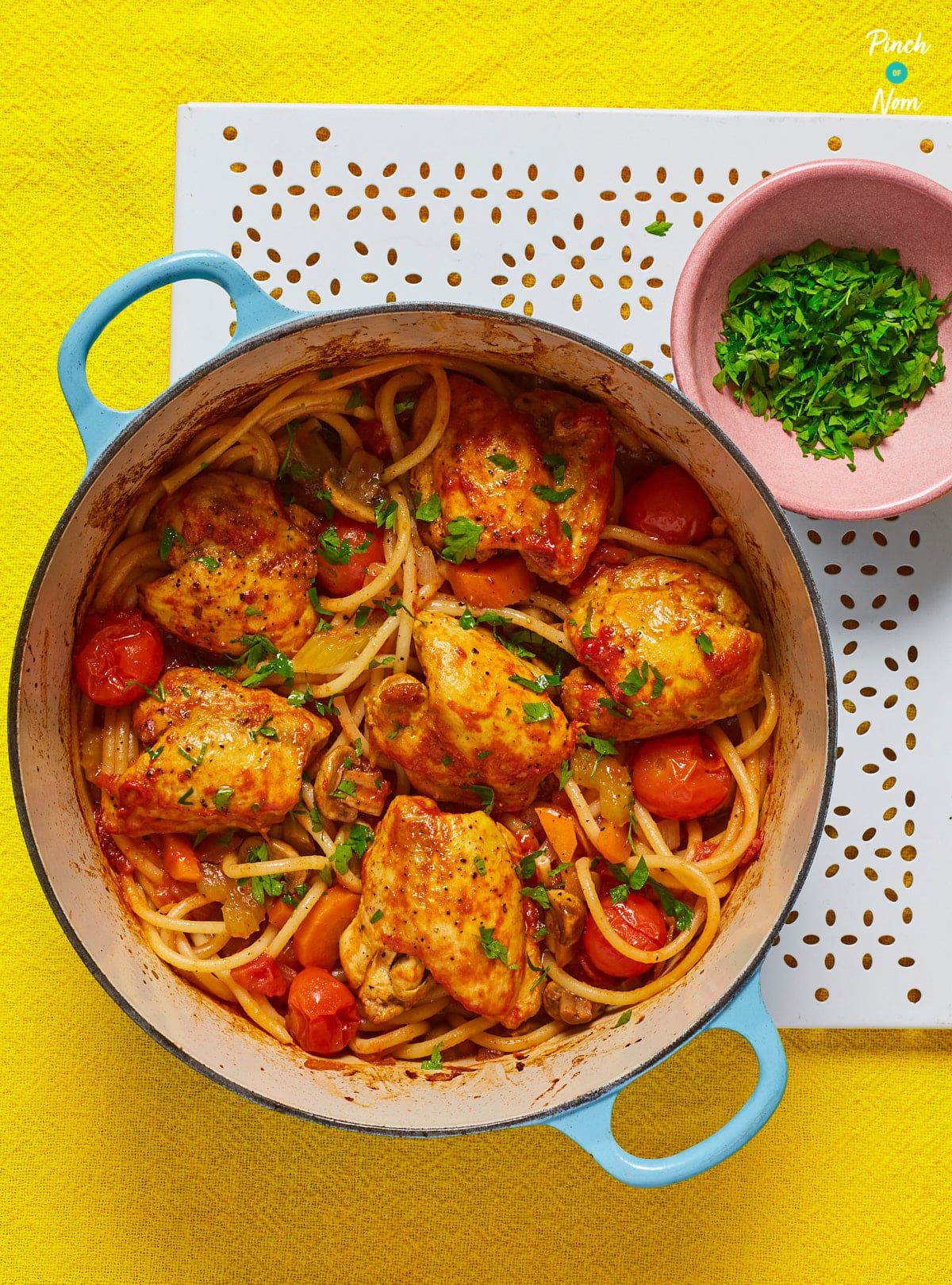A large oven dish is filled with a freshly-made batch of Pinch of Nom's slimming-friendly Baked Spaghetti with Chicken.