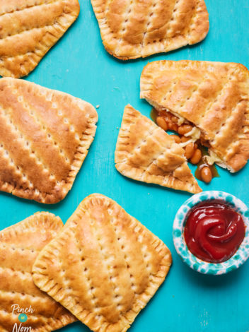 Cheesy Baked Bean Bakes pinchofnom.com