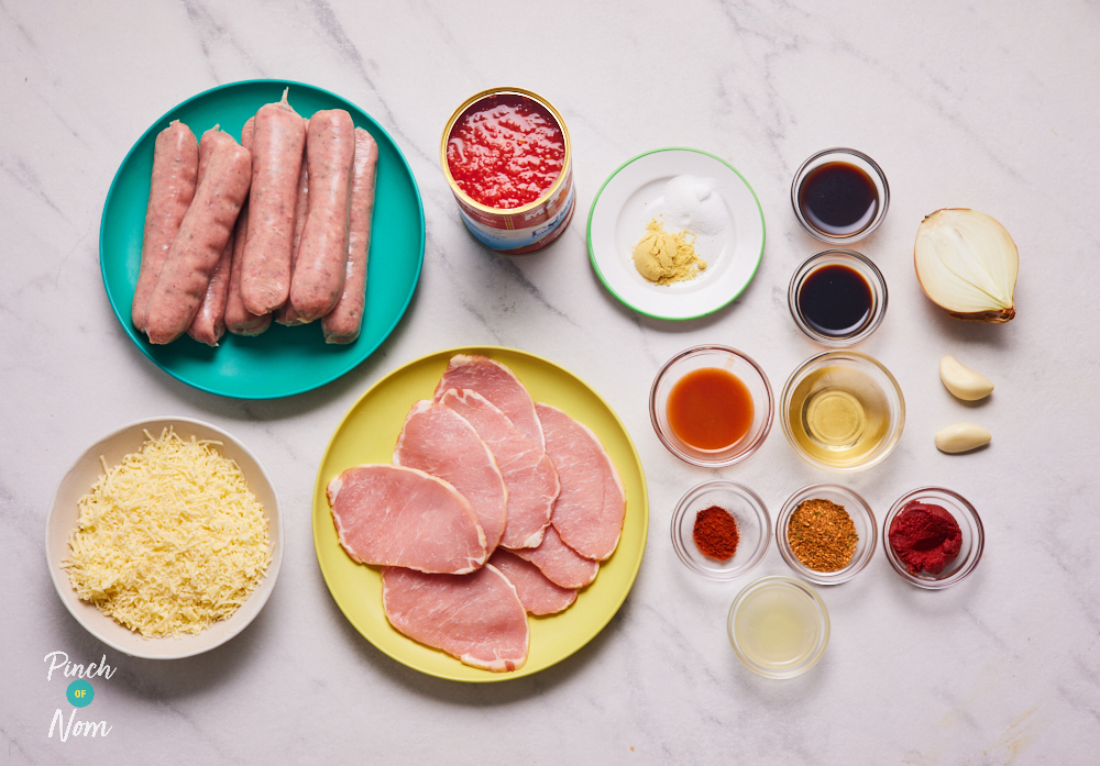The ingredients for Pinch of Nom's Hunter's Sausage are laid out on a kitchen counter. All the ingredients are measured out, waiting in small glass bowls, ready to begin cooking.
