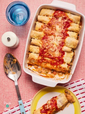 Creamy Chicken Enchiladas pinchofnom.com