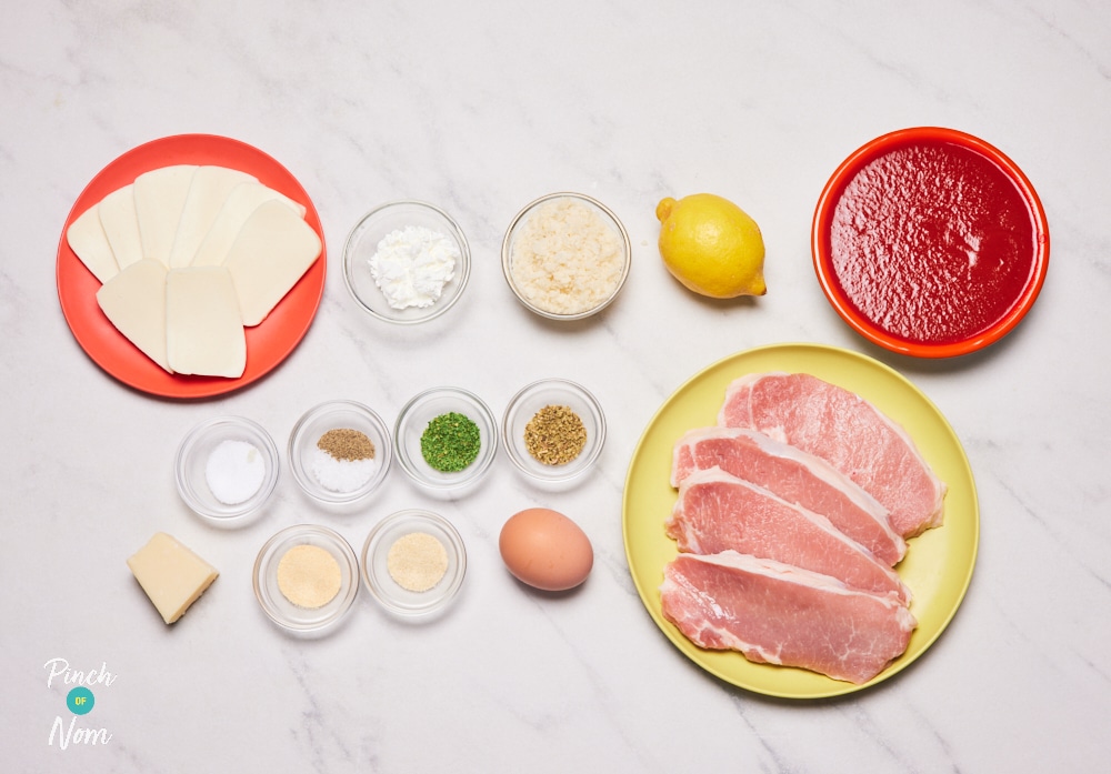 The raw ingredients for Pinch of Nom's slimming-friendly Pork Parmigiana are laid out on a kitchen counter, ready to begin cooking.