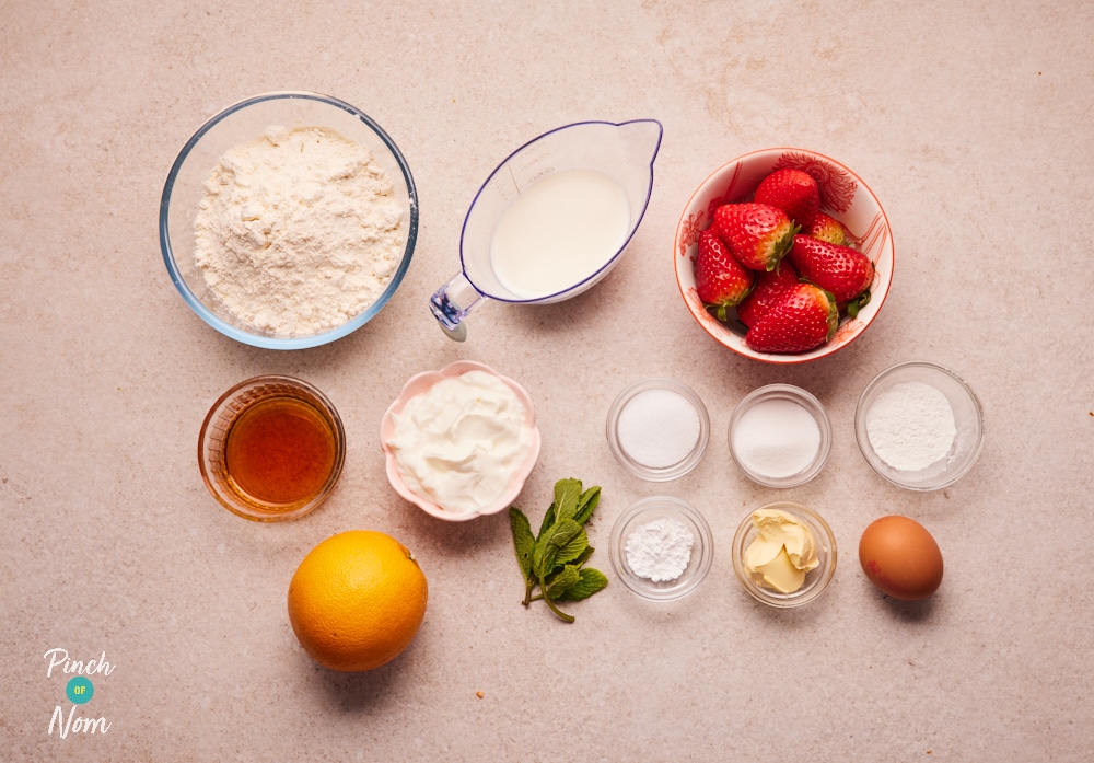 The raw ingredients for Pinch of Nom's slimming-friendly Pimm's Scones are laid out on a kitchen counter, ready to begin baking.