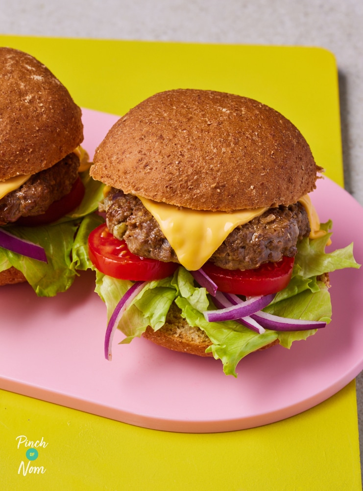 Chilli and Cheese Burgers served on a pink board