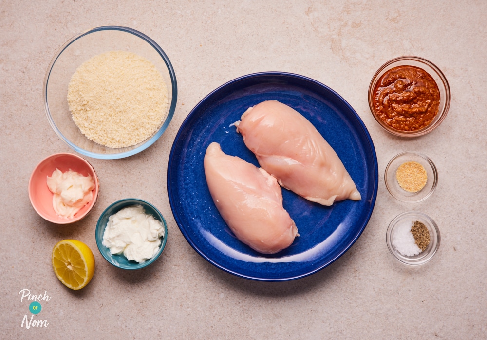 Ingredients for the Air Fryer Pesto Chicken Nuggets laid out on a table
