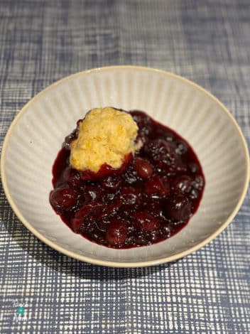 Slow Cooker Boozy Berries with Sweet Dumplings pinchofnom.com
