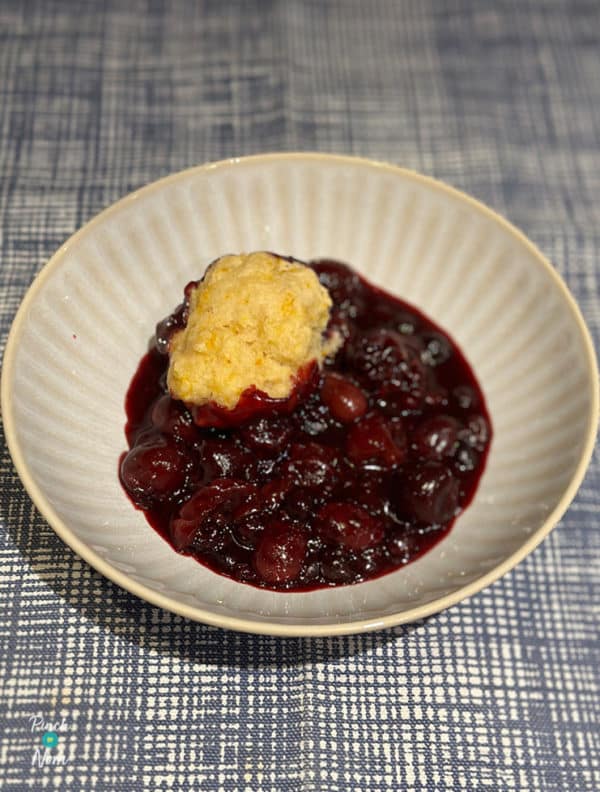 Slow Cooker Boozy Berries with Sweet Dumplings pinchofnom.com