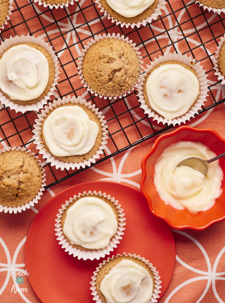 Pumpkin Spice Cupcakes, topped with cream cheese frosting, ready to serve.