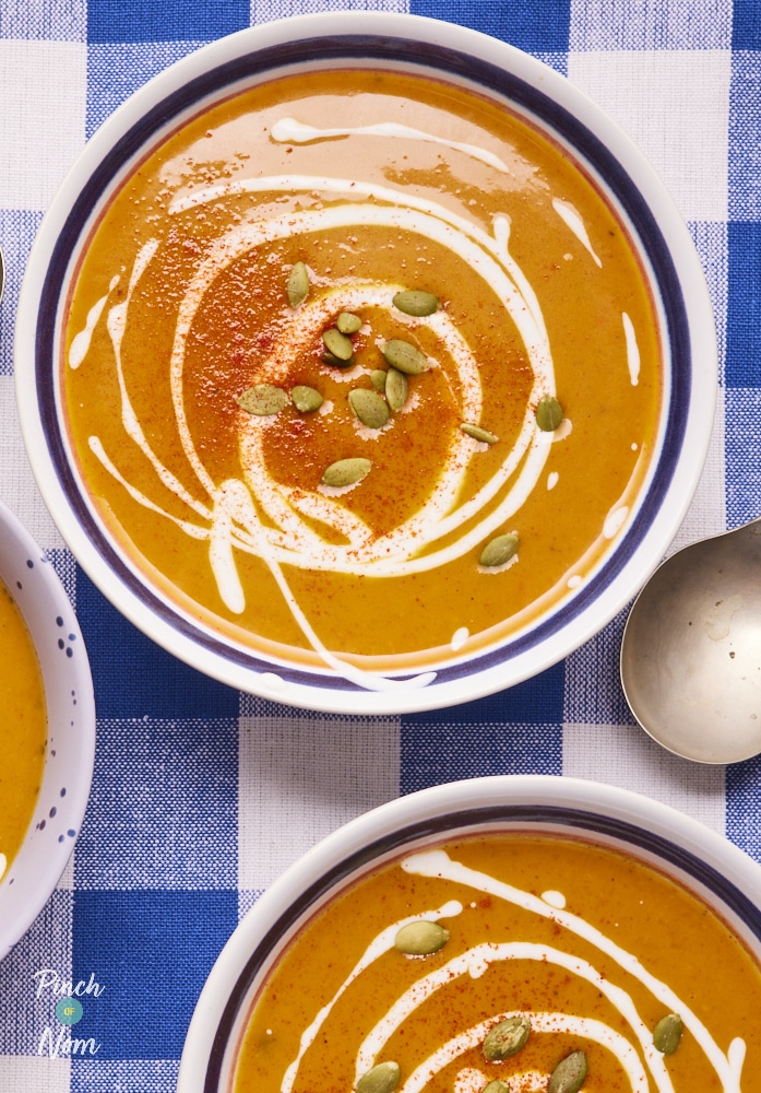 Spiced Pumpkin Soup topped with pumpkin seeds.